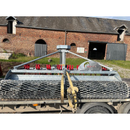 Herse 2,50m tracteur, sol fibré - OCCASION